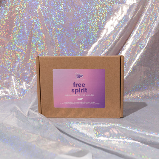 free spirit candle box featuring 12 soy tealights in earthy and herbal-inspired scents
