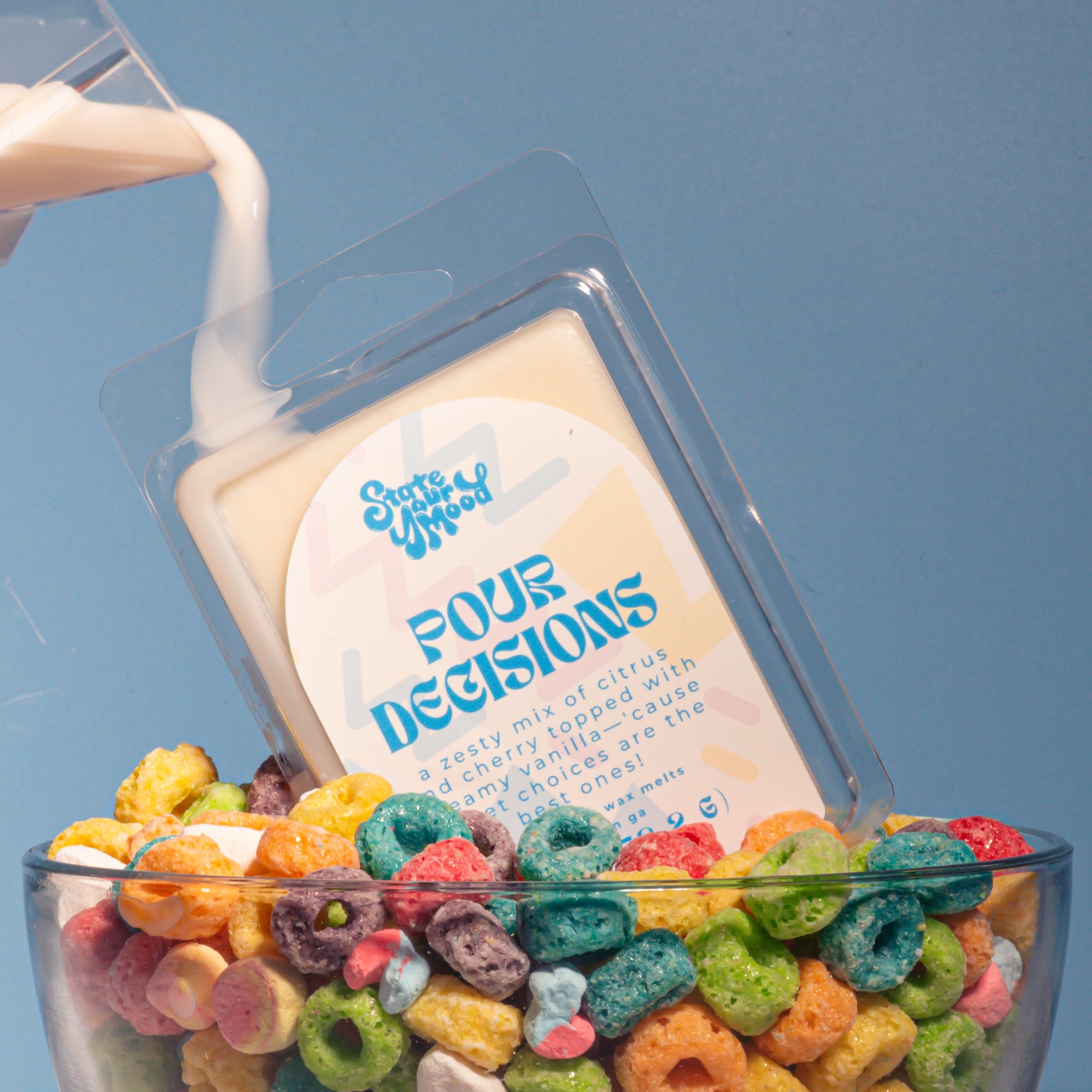 Pour Decisions fruity cereal soy wax melts styled in a cereal bowl with milk being poured, fun nostalgic product photo